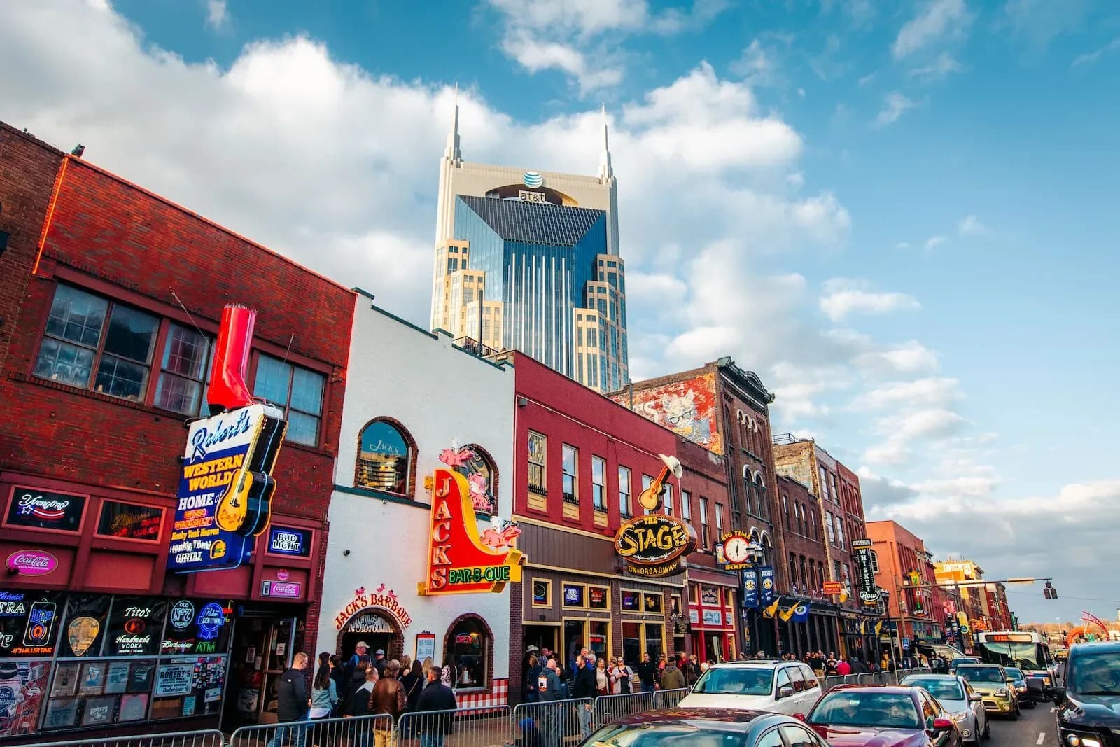 Broadway storefronts and the AT&T tower in downtown Nashville